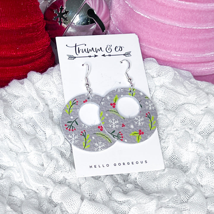 Holiday Earrings 
Open circle leather with berries and snowflakes 