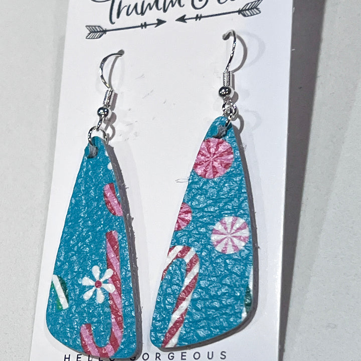 close up of festive candy cane blizzard leather open circle earring on Trumm & Co earring card