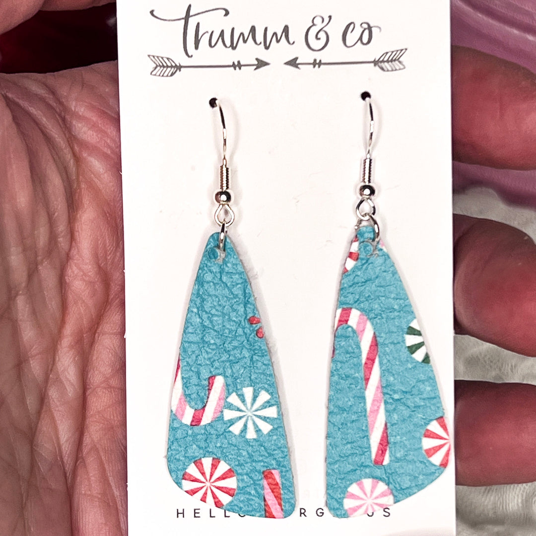 Festive angle bar leather earring on trumm and co earring card